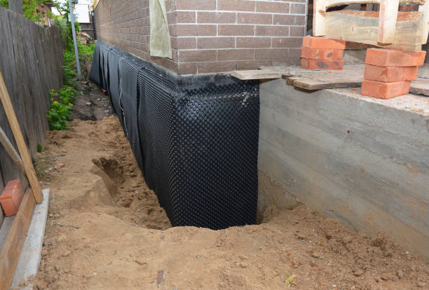 Happy homeowners after waterproofing job in Alvordton